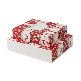 A tampa da caixa de papel da fita do Natal e a caixa de presente baixa projetam a impressão de CMYK